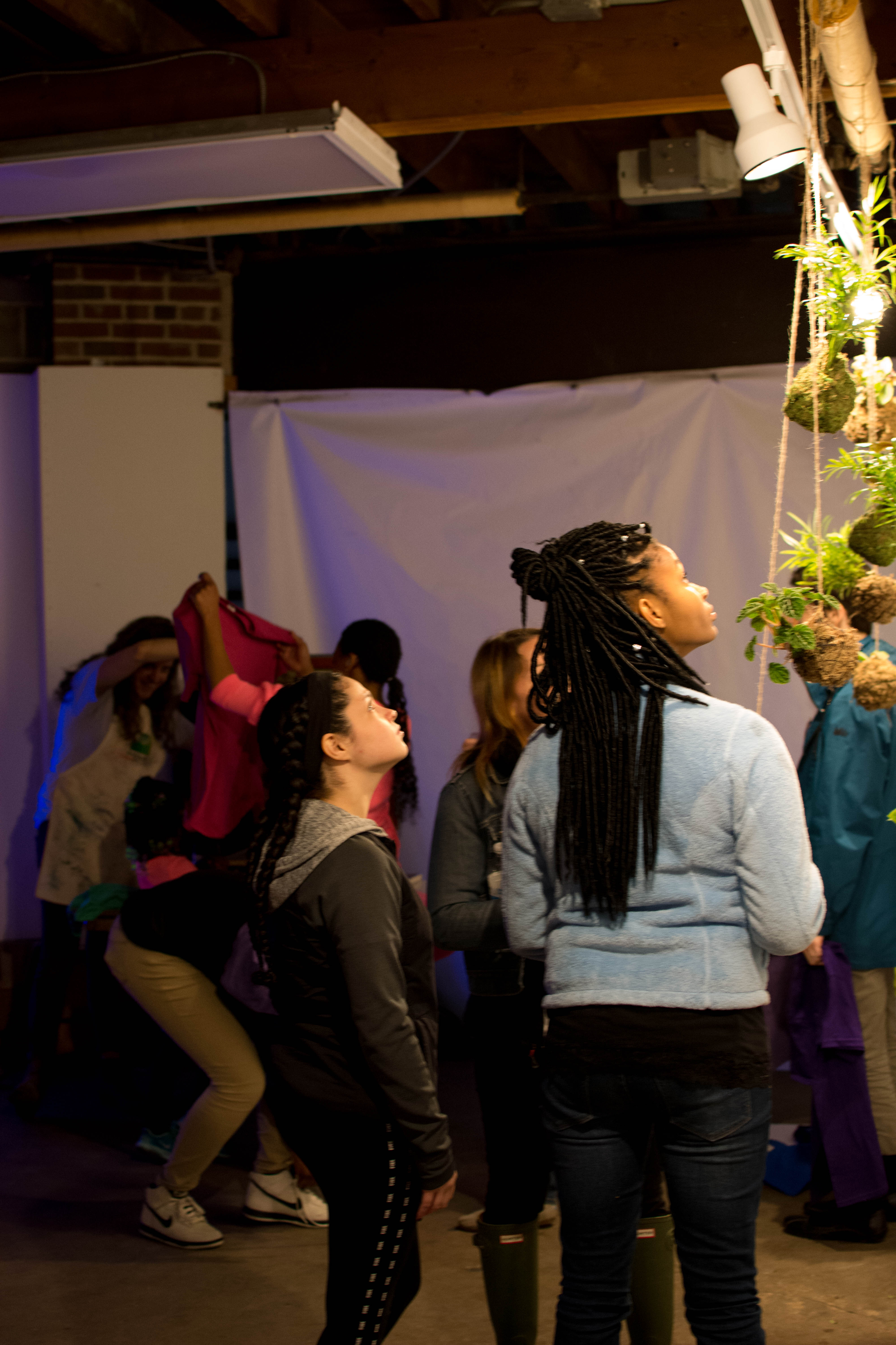 picture of teens viewing the string garden display