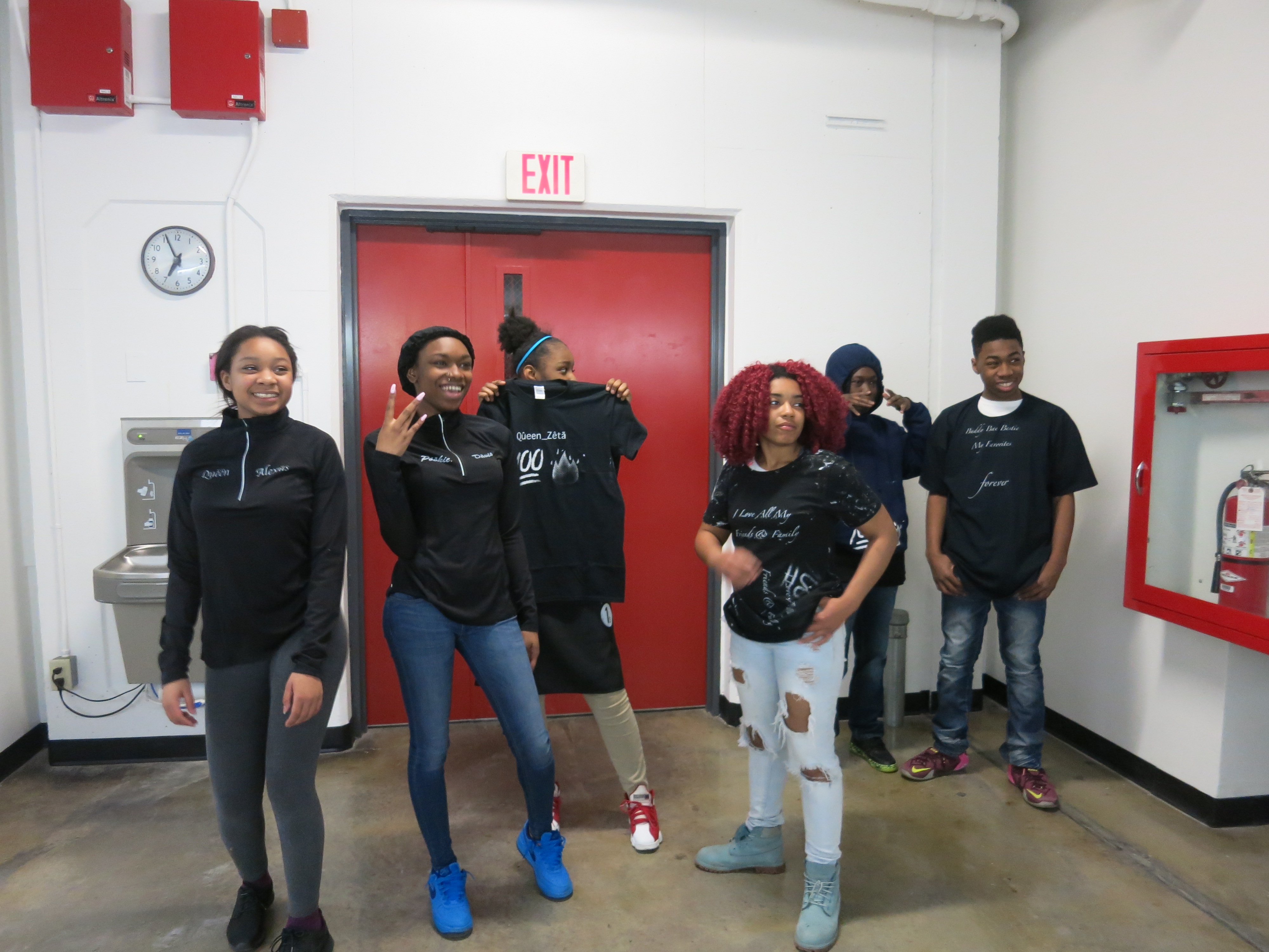 picture of teens screen printing during 15-week Air It Out semester